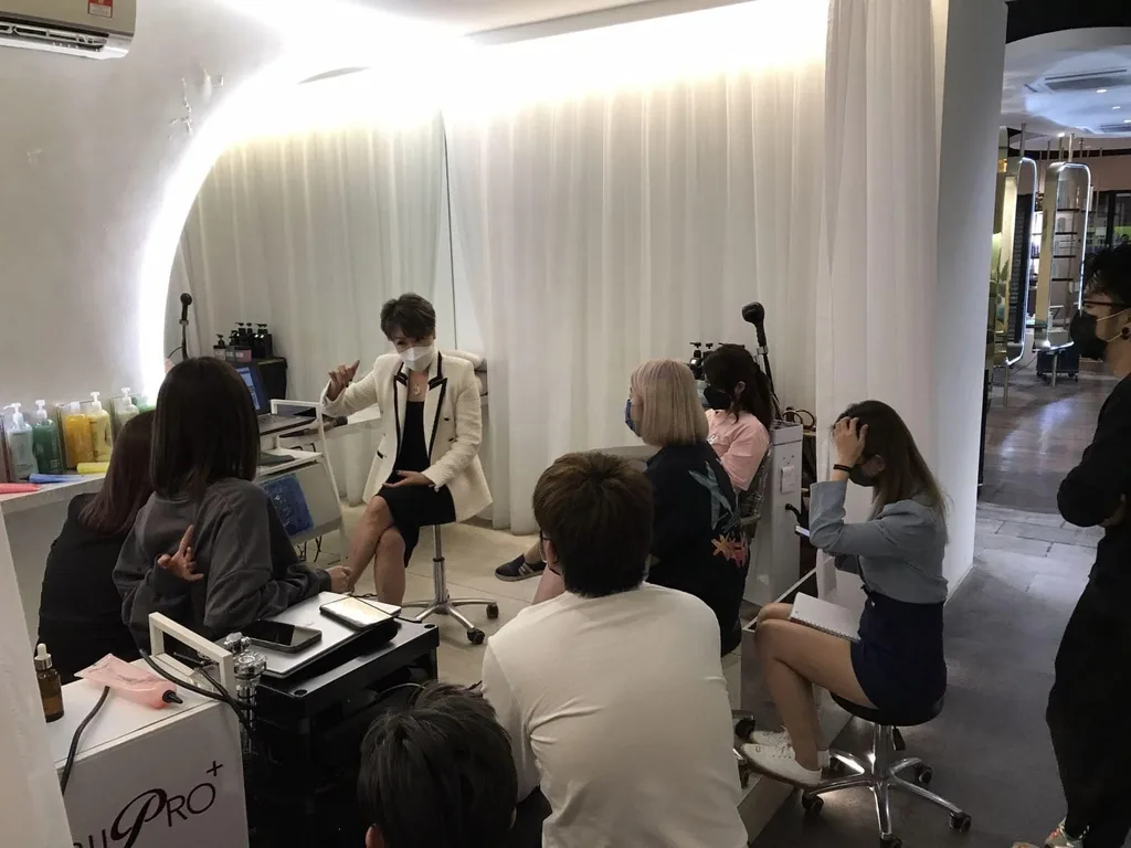 Capilo scalp care products presented at a salon sharing session